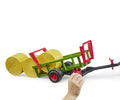 Round bale collector with 3 round bales
